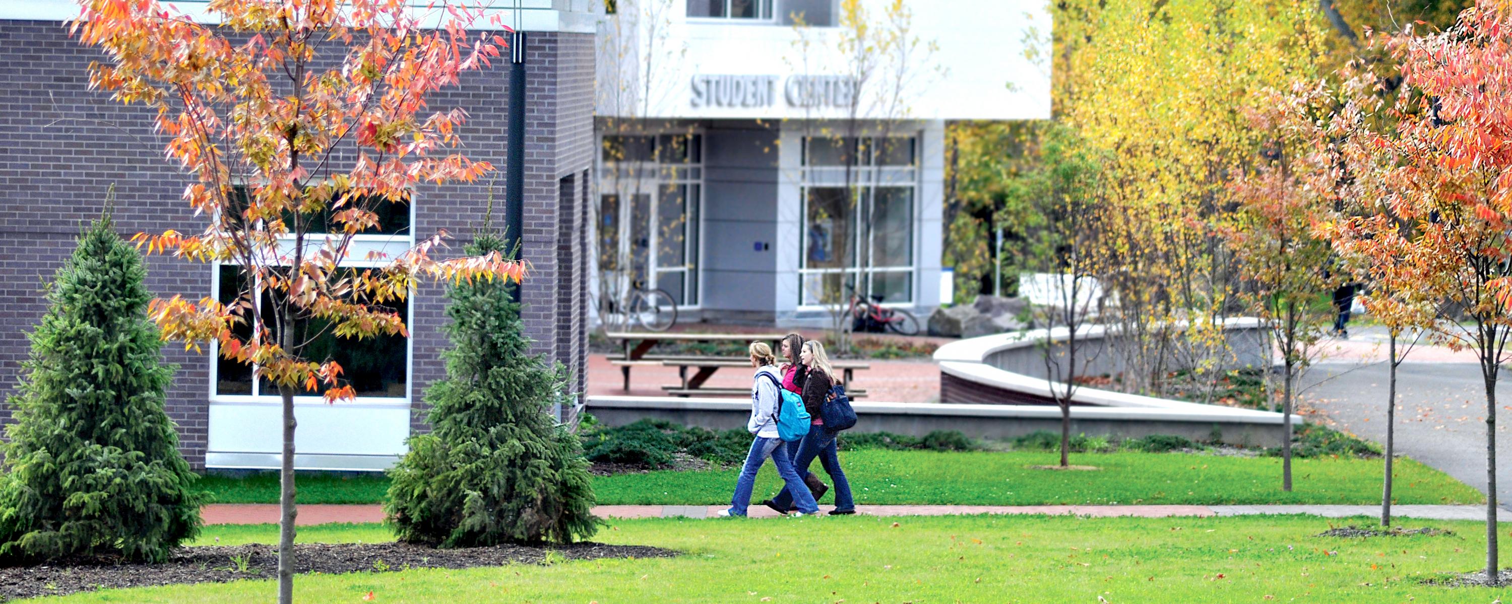 Students walk into Student Center on Utica campus