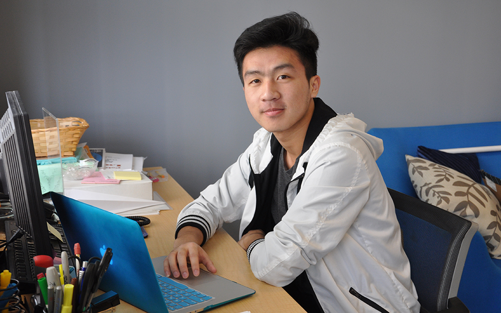 Student on his computer