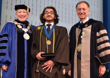 Vab Arya receiving the President's award with the SUNY chancellor and Dr. Sammakia