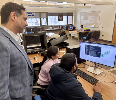 Dr. Amir Manzourolajdad, left, leads research on RNA inverse design