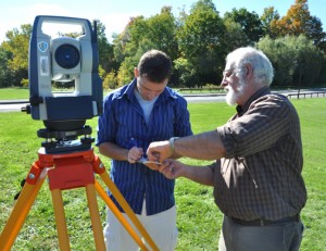 Student learning surveying equipment