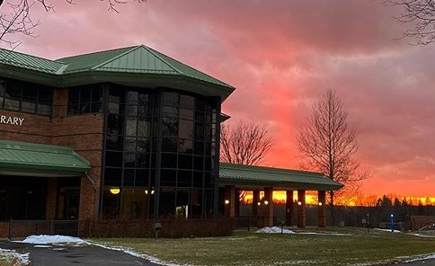 Image of Cayan Library north face at sunset