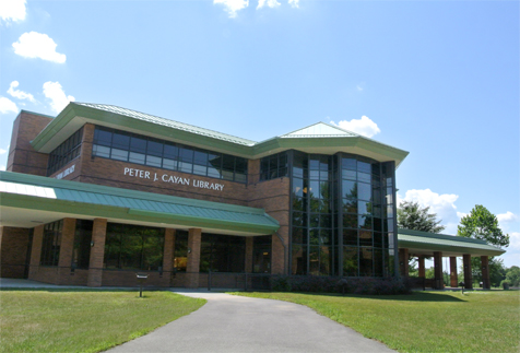 Image of the north face of Cayan Library in summer