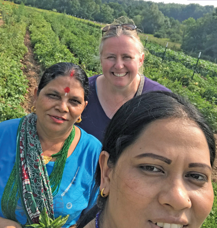 Dr. Kathryn Stam, cultural anthropologist, collaborates with Bhutanese-Nepali refugees at an organic farm in Sauquoit, NY