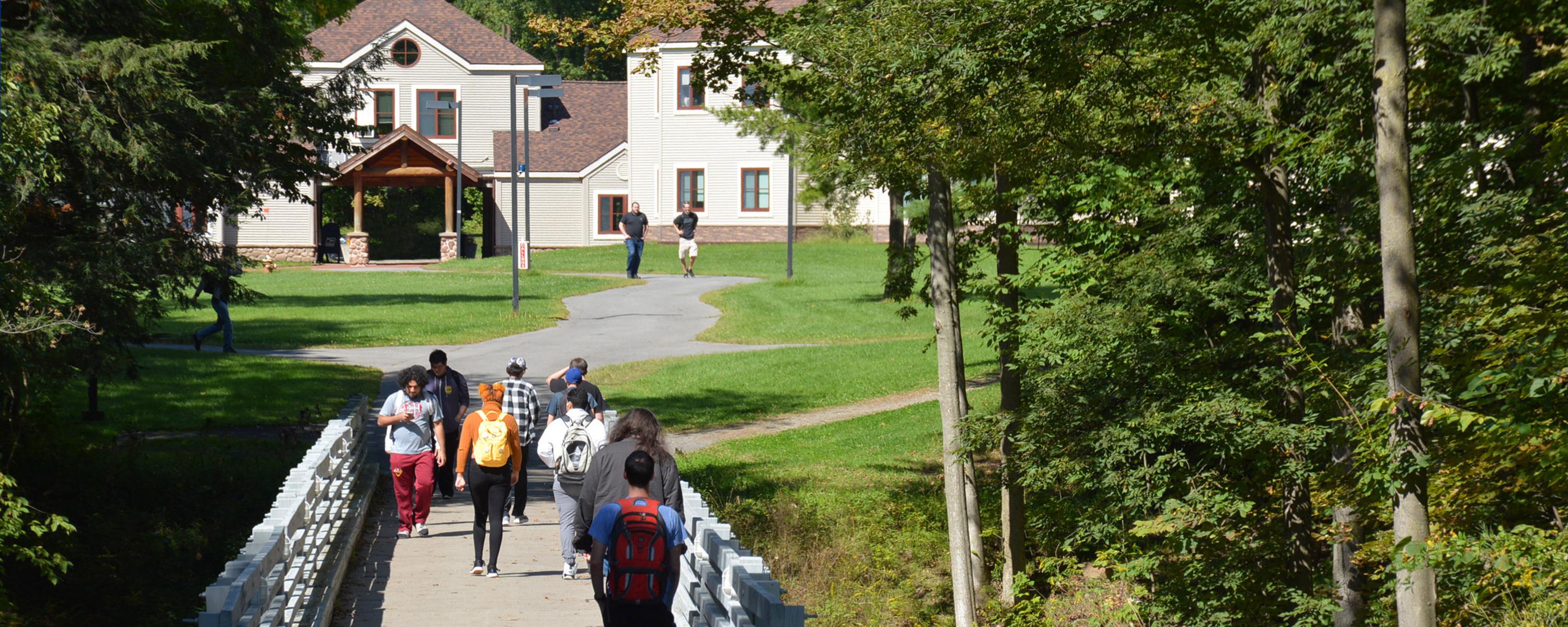 Students walking near Adirondack Residence Hall