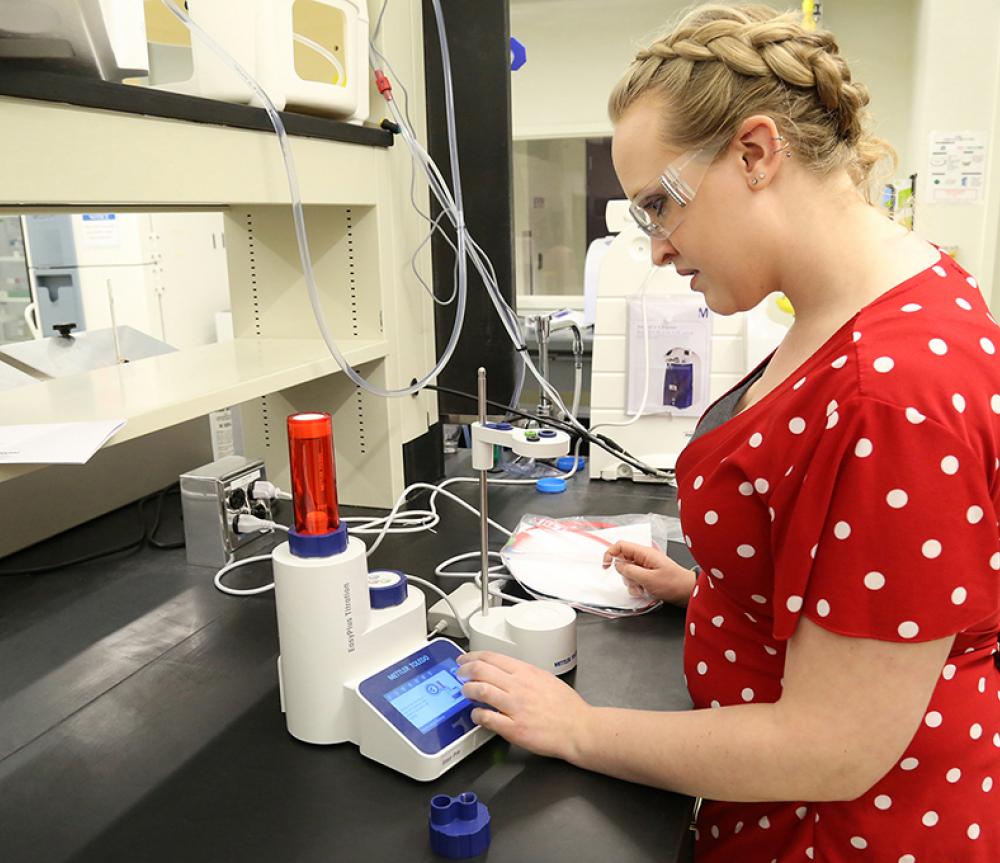 SUNY Poly student in a lab
