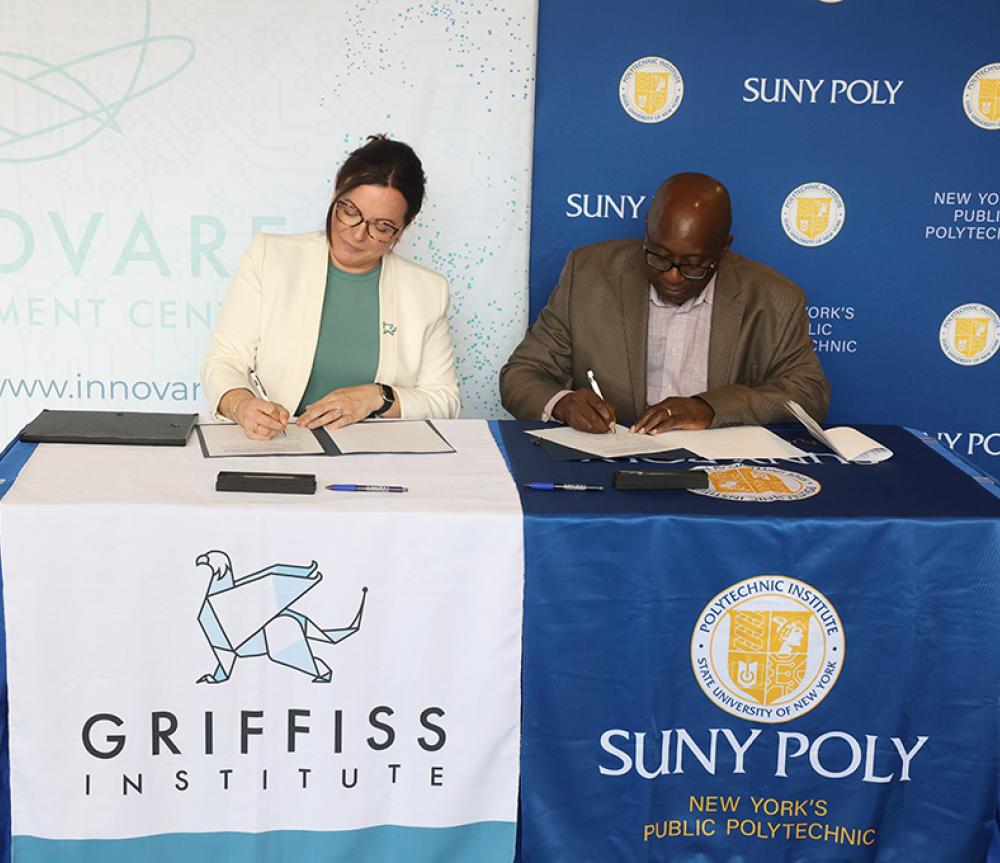Griffiss Institute's Heather Hage and Dr. Wole Soboyejo Sign the MOU