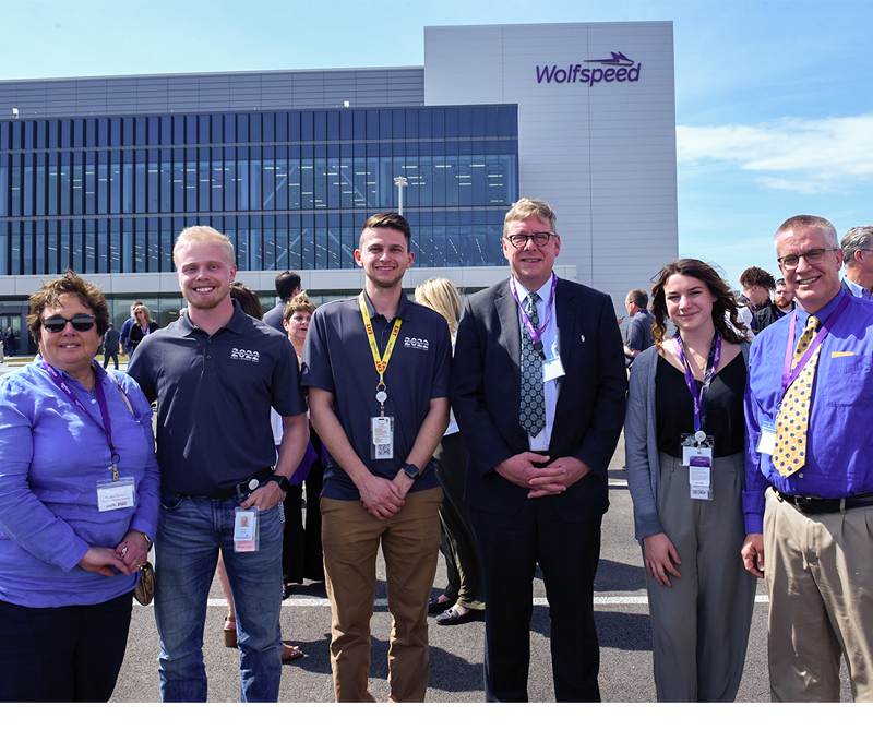 Pres. Laursen with alumni and students at Wolfspeed ribbon cutting