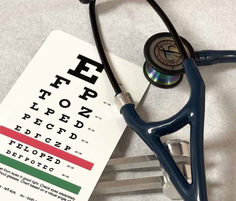 health equipment including vision chart and stethoscope